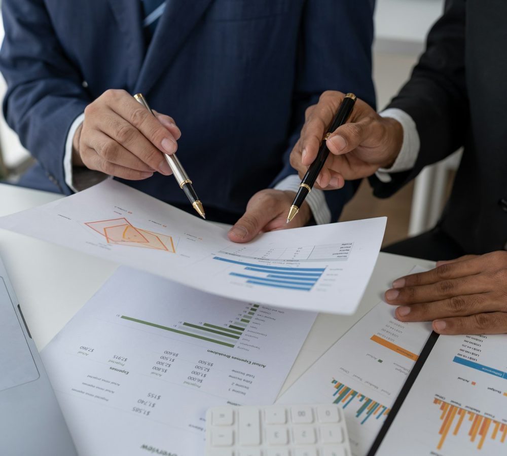 business-people-meeting-in-the-office-calculate-company-tax-and-investment-income-strategic-planning.jpg